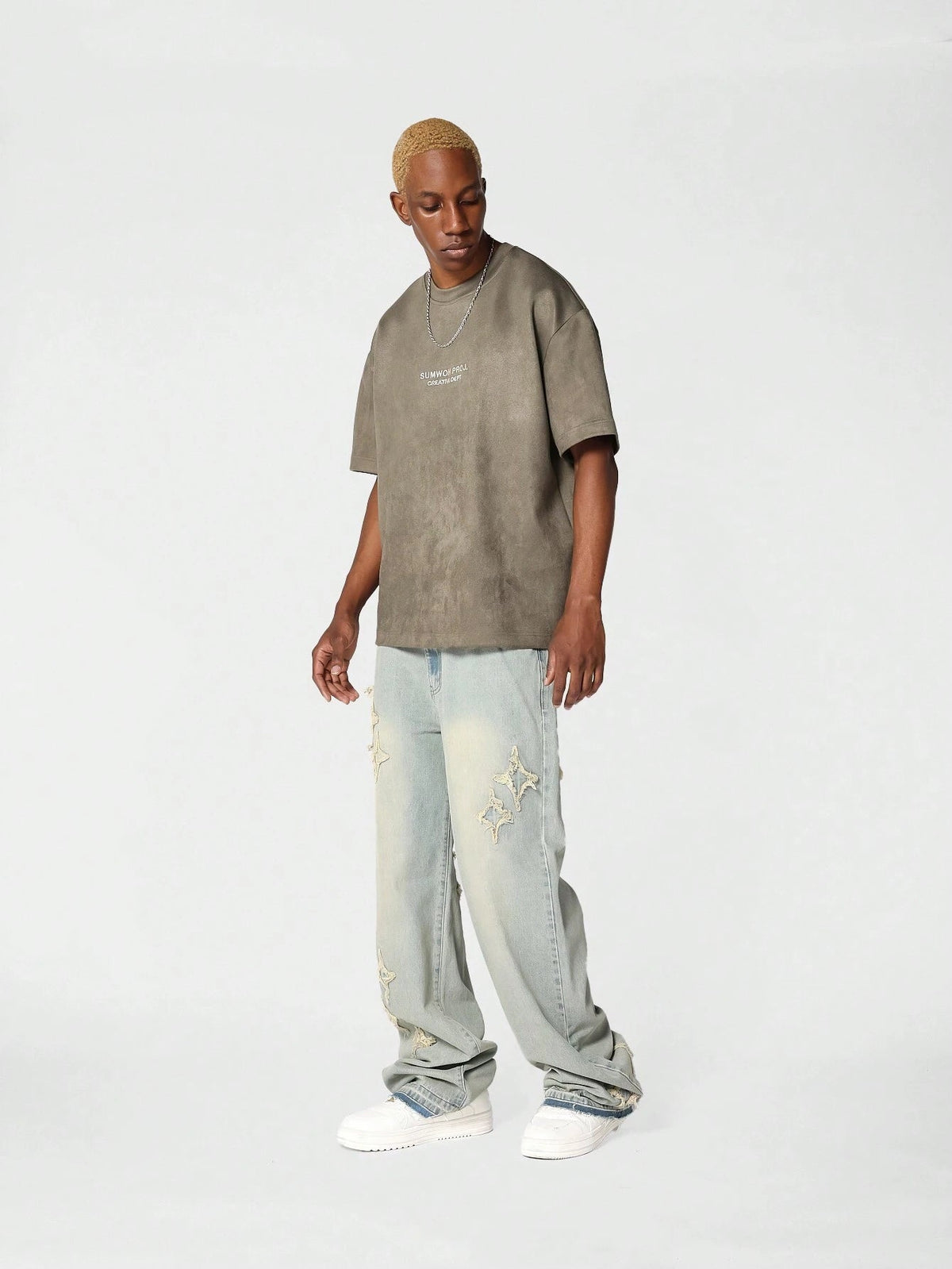 Calça Pavtros Denim Solto com Aplicação Stars