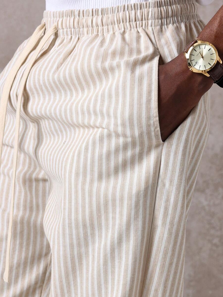 Calça Pavtros Studios Linen Pinstripe Relaxed Trousers — Foto 15