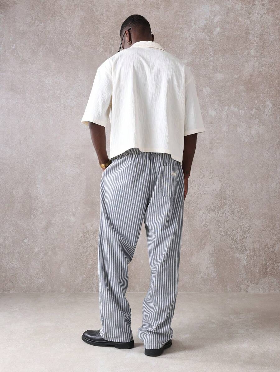 Calça Pavtros Studios Linen Pinstripe Relaxed Trousers — Foto 20