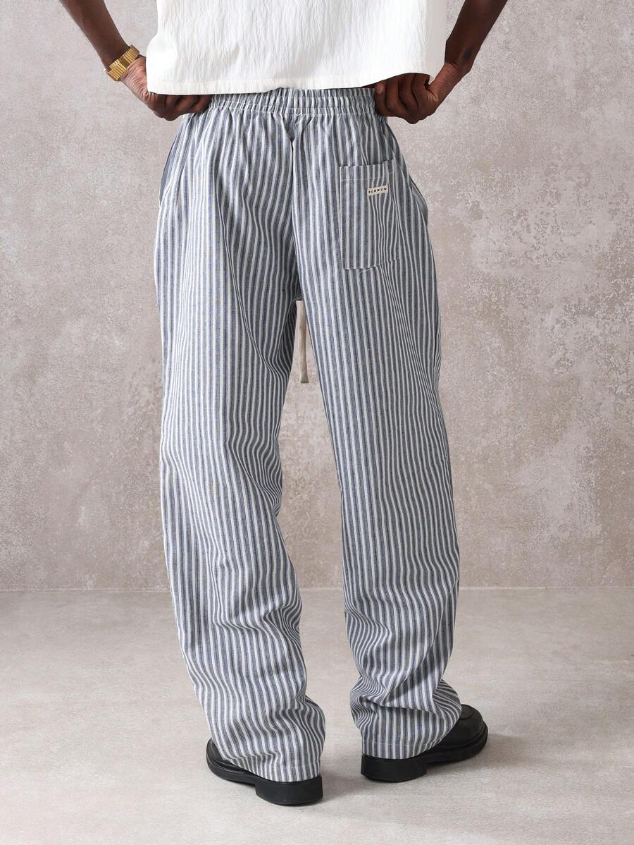 Calça Pavtros Studios Linen Pinstripe Relaxed Trousers — Foto 21