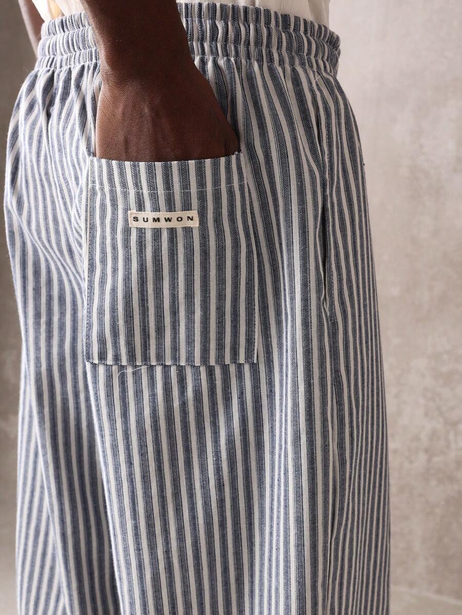 Calça Pavtros Studios Linen Pinstripe Relaxed Trousers — Foto 23