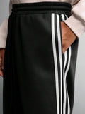 SUMWON Calça de Moletom Relaxada com Ajuste de Barril, Detalhe de Listras Laterais e Cordão na Cintura para Conforto Casual do Dia a Dia, Lisa