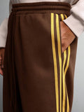 SUMWON Calça de Moletom Relaxada com Ajuste de Barril, Detalhe de Listras Laterais e Cordão na Cintura para Conforto Casual do Dia a Dia, Lisa
