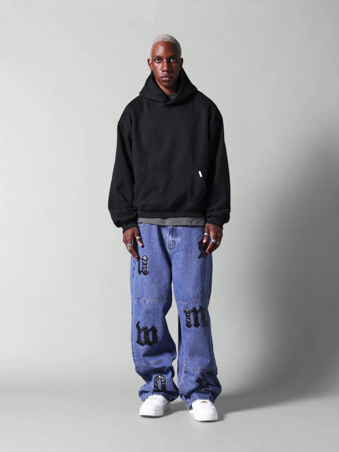 Calça Pavtros Jeans Folgada Com Distintivos - foto 1