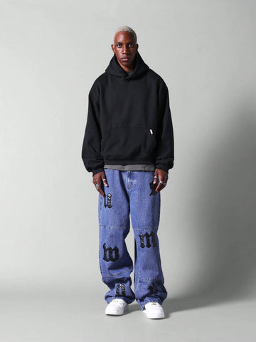 Calça Pavtros Jeans Folgada Com Distintivos