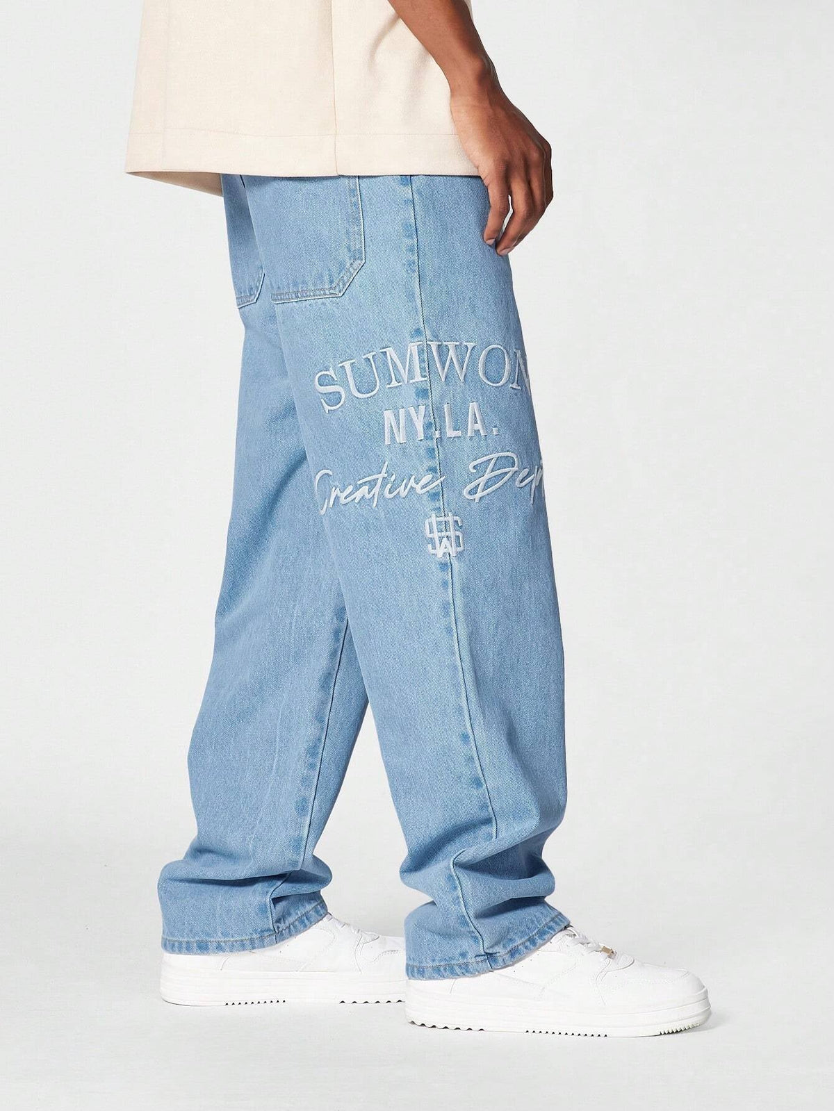 Calça Pavtros Denim reta com bordado