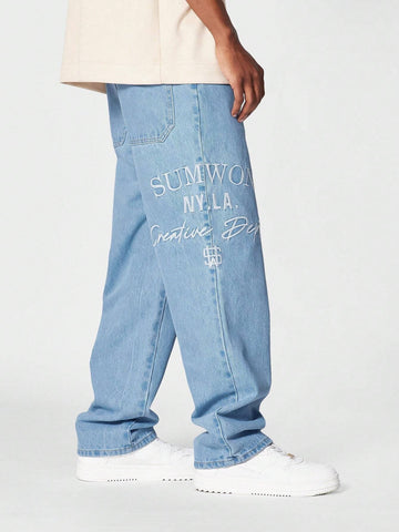 Calça Pavtros Denim reta com bordado