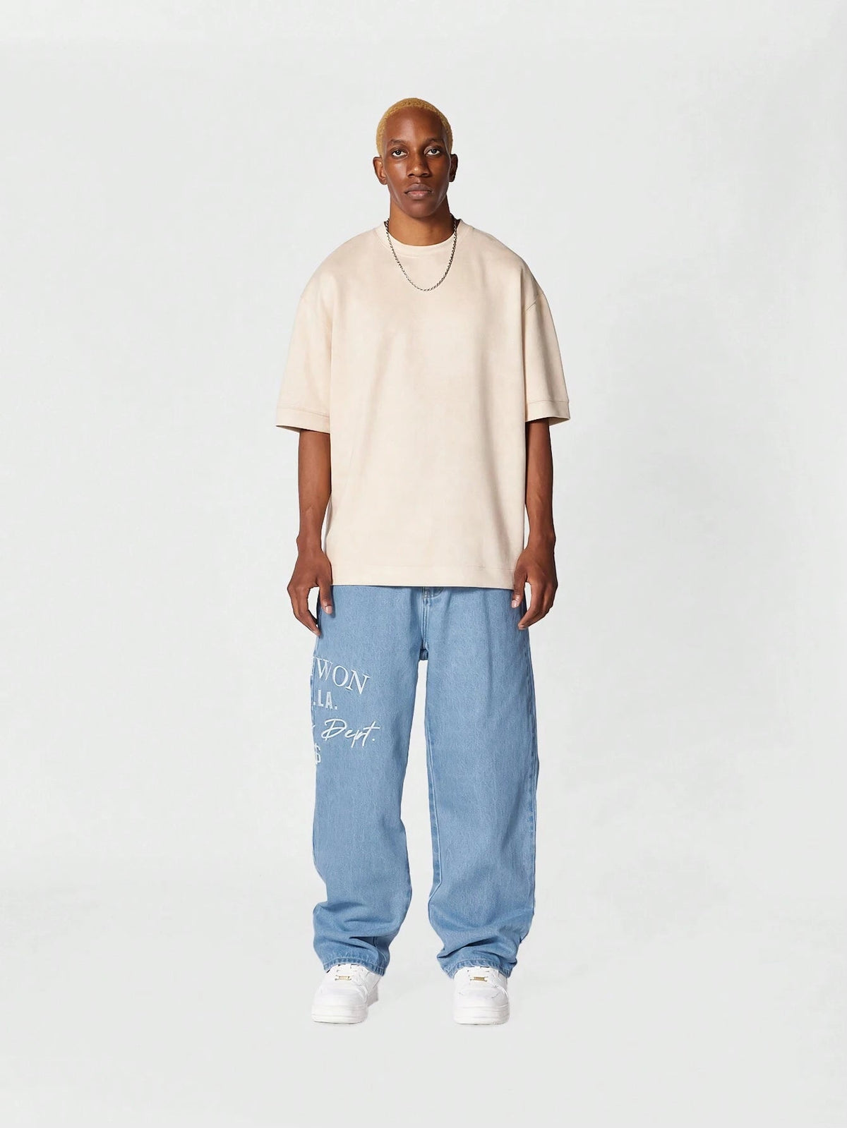 Calça Pavtros Denim reta com bordado